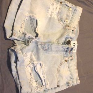 Distressed denim shorts